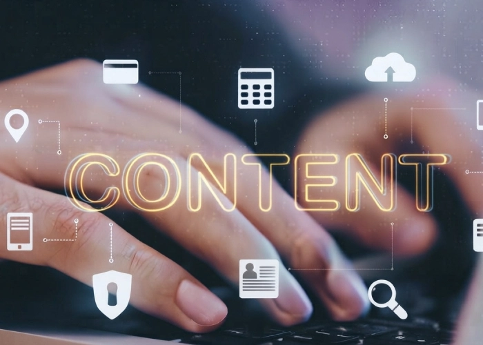 Person typing on a laptop with a digital content concept overlaid, including search, cloud, document, security, and payment icons.
